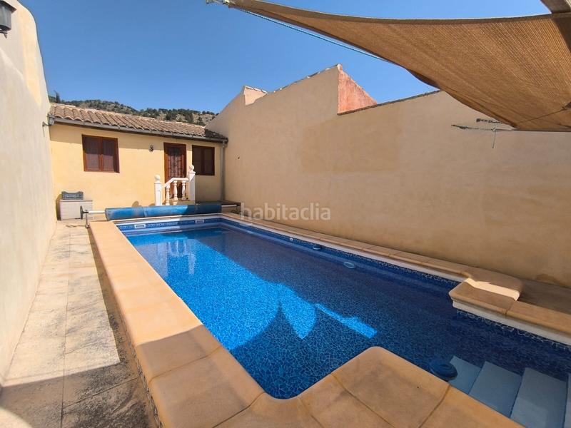 Foto 770d83e8-90e1-4bed-878a-ce3fb60d90d2. Casa esta espaciosa villa de 4 dormitorios y 2 baños en chinorlet ofrece una excelente combinación de reformas completas y espacio para en Monòver