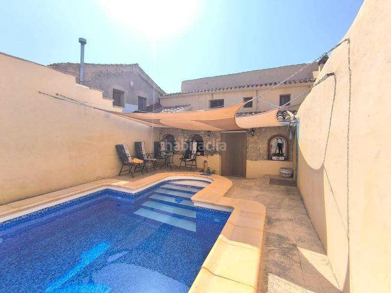 Foto 89e59085-449f-4ed9-8685-a627c841bc9c. Casa esta espaciosa villa de 4 dormitorios y 2 baños en chinorlet ofrece una excelente combinación de reformas completas y espacio para en Monòver