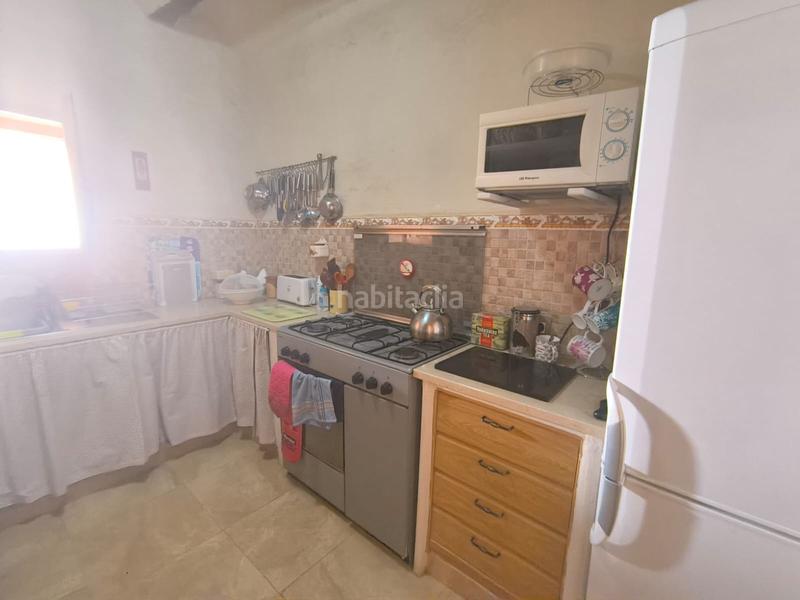 Foto b16a93f9-b7ec-47d1-a10e-7ac790bb8d7b. Casa esta espaciosa villa de 4 dormitorios y 2 baños en chinorlet ofrece una excelente combinación de reformas completas y espacio para en Monòver