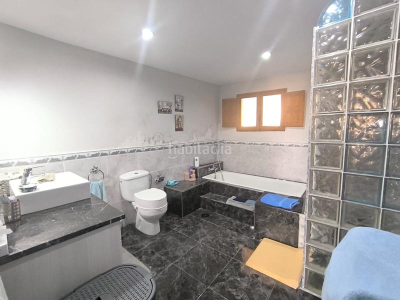 Foto b5cb4e23-383f-4ba9-af02-e3fdc23918eb. Casa esta espaciosa villa de 4 dormitorios y 2 baños en chinorlet ofrece una excelente combinación de reformas completas y espacio para en Monòver