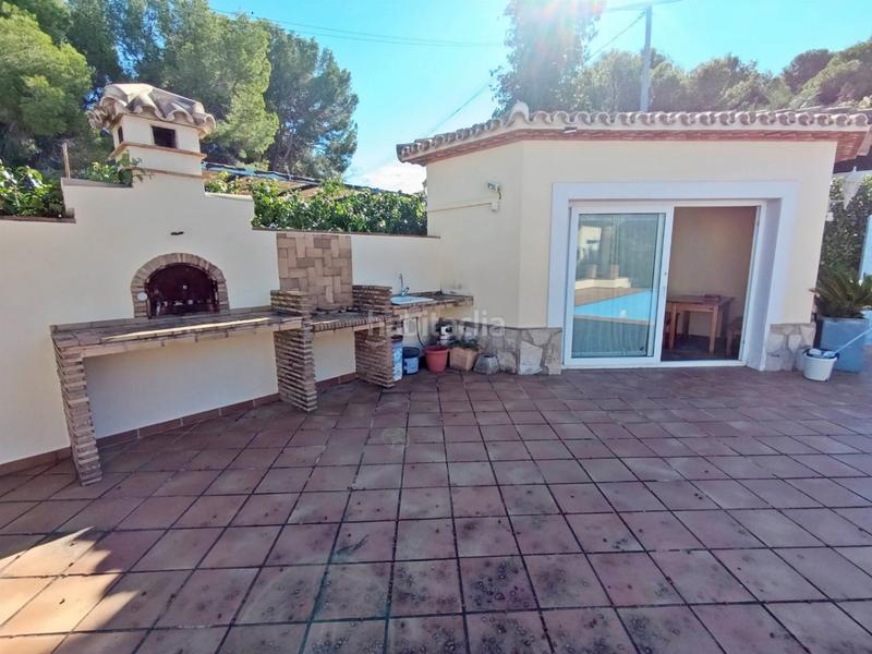 Foto 8619a139-0b1d-4d26-8684-db806a6c276a. Chalet mit heizung parking pool in Las Rotas / Les Rotes Dénia