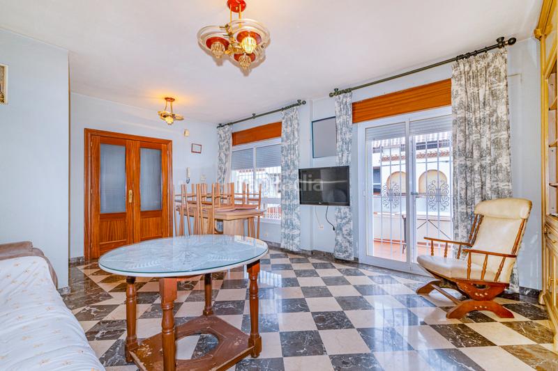 Foto c0ff1239-e673-4960-833c-4d58888e249d. Casa aparellada amb aparcament a Fuente Vaqueros