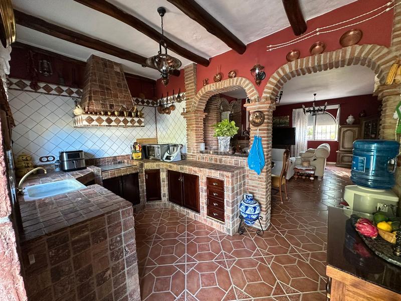 Foto 5f56f02a-f330-4060-8ace-79239232e4db. Xalet amb xemeneia calefacció aparcament piscina a Córdoba