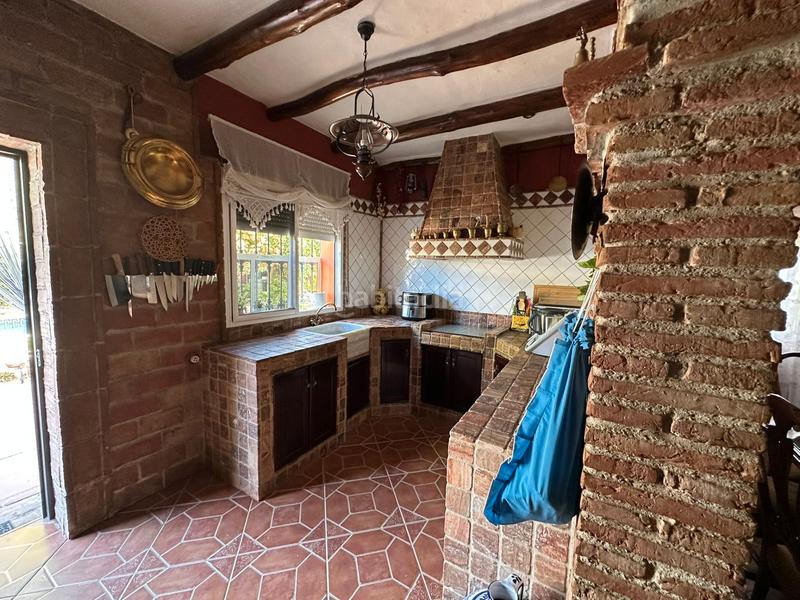 Foto cd54029a-6db7-45cc-854a-63325d78e5cf. Xalet amb xemeneia calefacció aparcament piscina a Córdoba