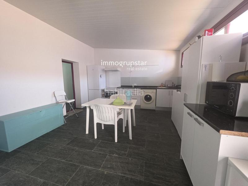 Foto a1a5fd52-2926-40a7-874f-ae64d36665cc. Casa adosada casa con local y terraza soleada en la costa brava en Sant Feliu de Guíxols