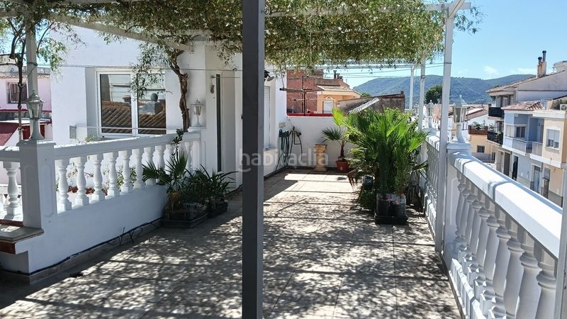 Foto b7c2c451-f900-4f1c-a17a-2b9e91213200. Casa adossada amb aparcament a Xeraco