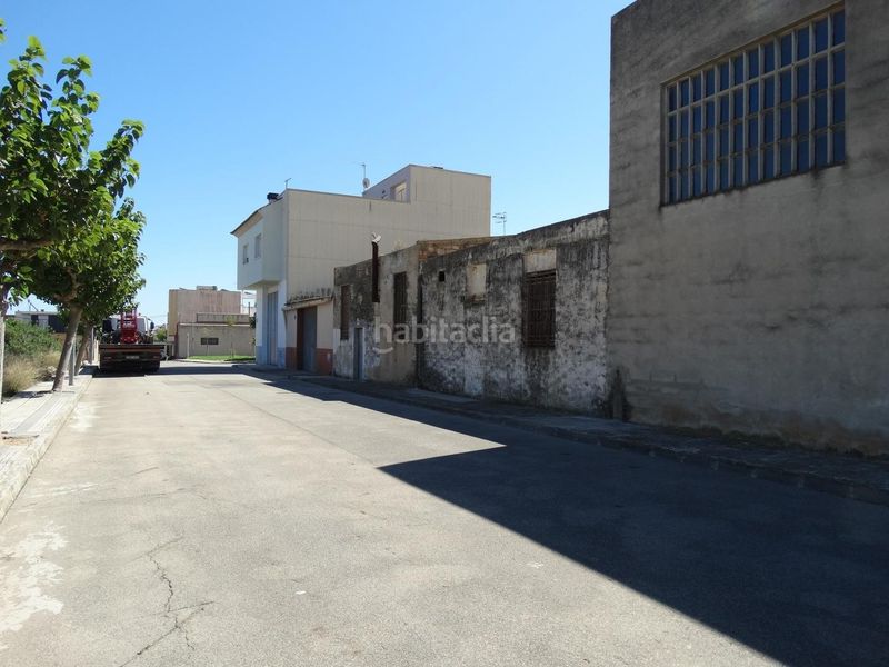 Foto 69f0d355-25da-4cfc-abe2-abe044b84efd. Local comercial en atenes 7 almacen con acesos a dos calles en Amposta