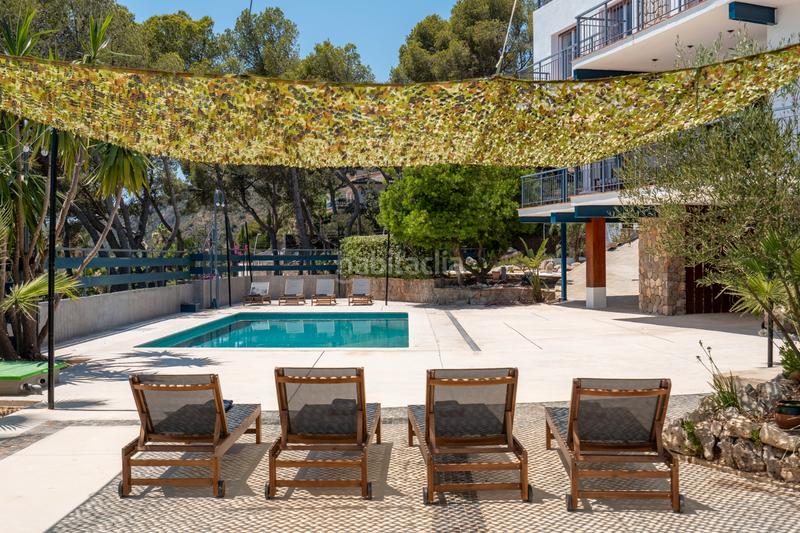 Foto 30f7b97a-cffb-49d7-952c-2a59457d8862. Lloguer casa amb xemeneia aparcament piscina a Bellamar Castelldefels