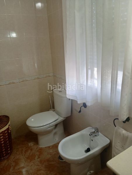 Foto c34bf08f-5e26-48b3-8351-a1cef4a947ea. Casa adossada amb calefacció aparcament a Umbrete