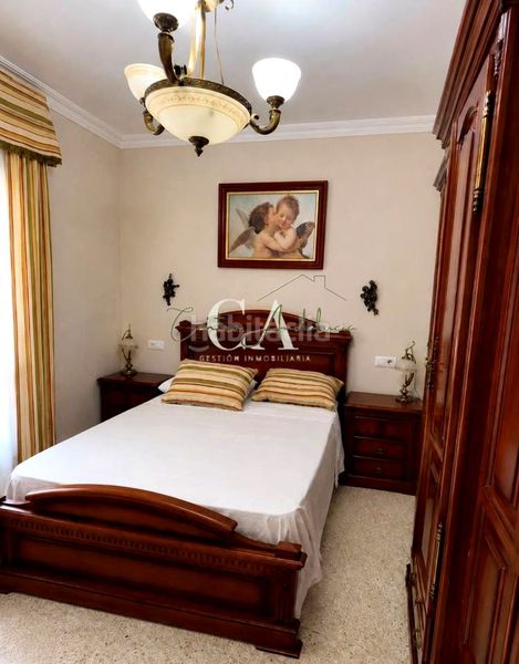 Foto 8a944f6e-77da-4fc5-bedf-035e9bb3765f. Casa amb aparcament a Puente Genil