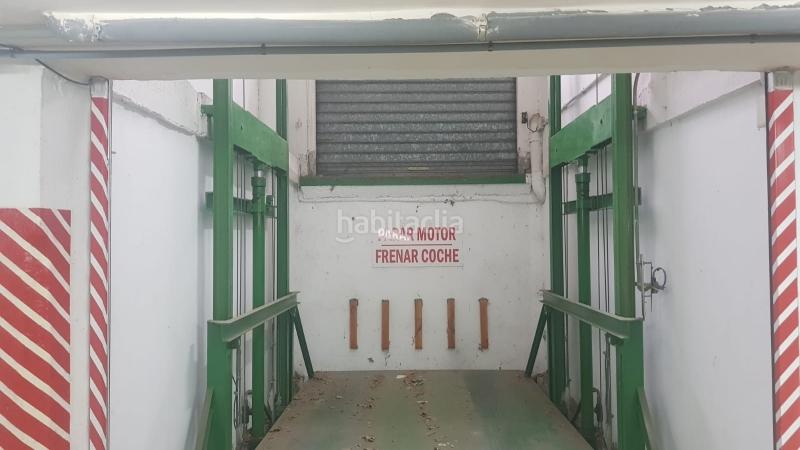 Foto bd291951-d0d2-4478-a56b-f779a81e0ecb. Car parking in Oliva pueblo Oliva