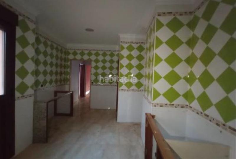 Foto a063184d-311a-4cbe-b6da-31b838376421. Casa aparellada a Palma del Condado (La)