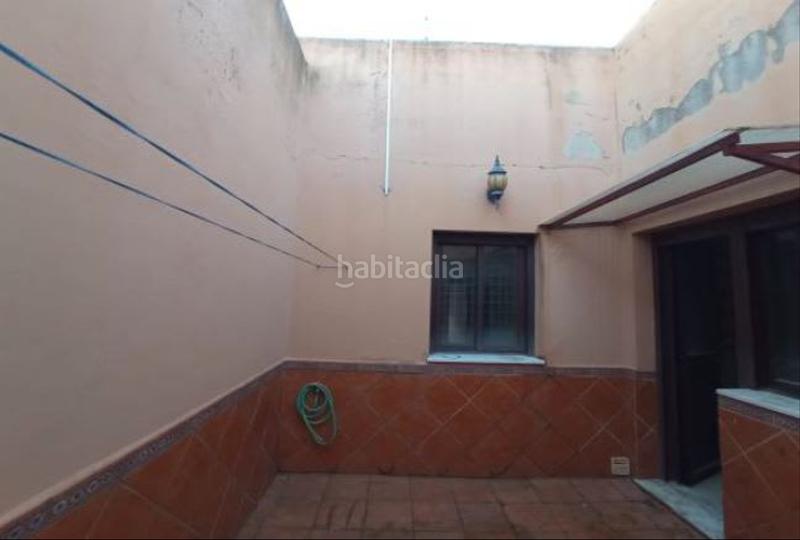 Foto c74a0797-44ee-430b-ac0d-7a7c73f5b770. Casa aparellada a Palma del Condado (La)