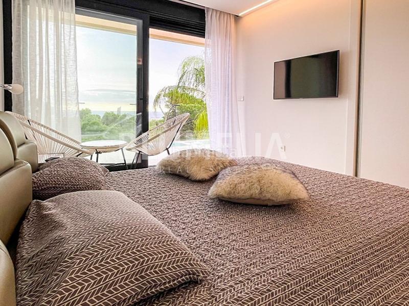 Foto 4bf021a7-9b45-4d12-ba7a-70b2b9fb3b7e. Casa amb calefacció aparcament piscina a Golf Bahía Finestrat