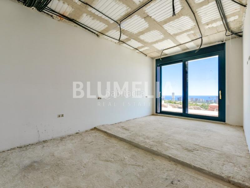 Foto c85ca36b-a56c-44a0-914b-fc8228ee60be. Casa con parcheggio in Golf Bahía Finestrat