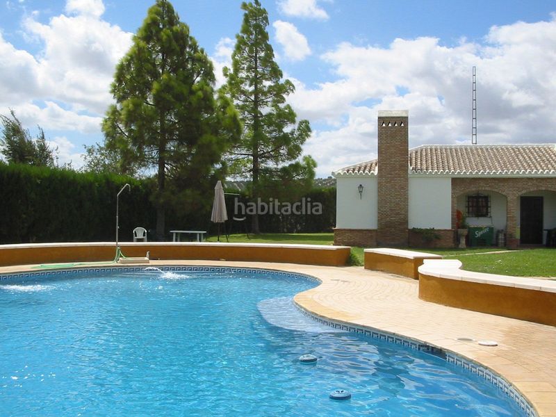 Foto aae14917-aa7b-4ee7-b2bd-f3a60db7b135. Masia amb xemeneia piscina a Marchena