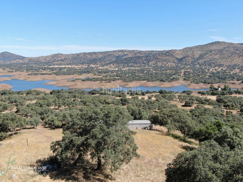 Foto 334a0a51-579b-46f9-b1ca-73d337aa765c. Masia amb xemeneia piscina a Cazalla de la Sierra
