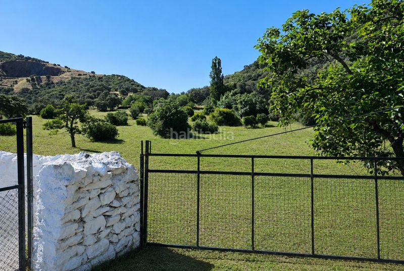 Foto cc524cc4-3b9a-4370-a9f4-72591c82cfec. Masia amb xemeneia piscina a Cazalla de la Sierra
