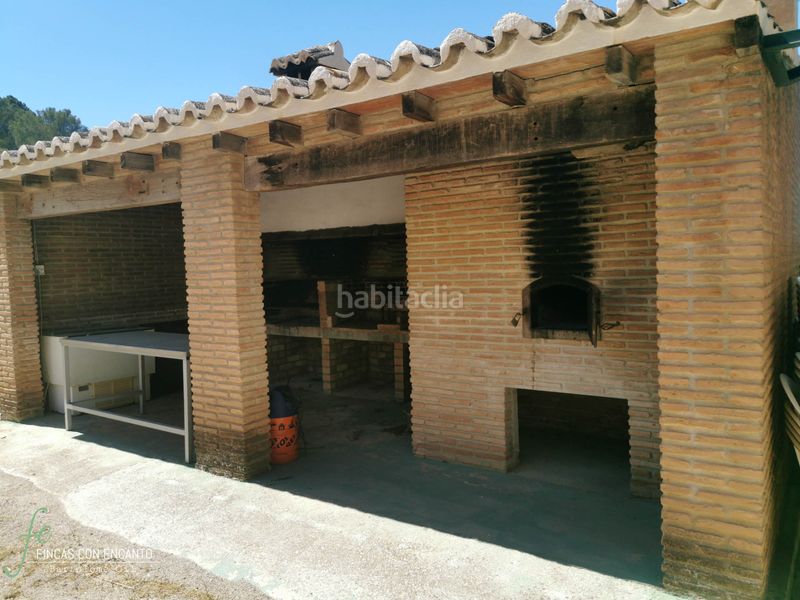 Foto f5cd6940-7e48-4147-8e08-2029b41fd4ae. Masia amb xemeneia calefacció aparcament piscina a Málaga