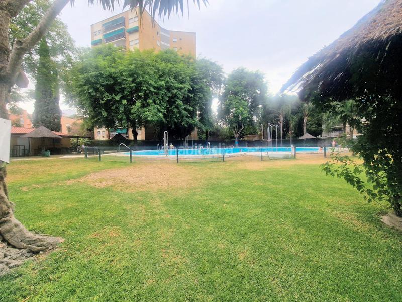 Foto 51c5e889-2923-4b51-99b9-fcafafdfb9f9. Flat with heating parking pool in El Porvenir Sevilla