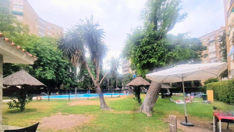 Foto adcb25bd-5458-4940-8bd6-998429f917d3. Flat with heating parking pool in El Porvenir Sevilla