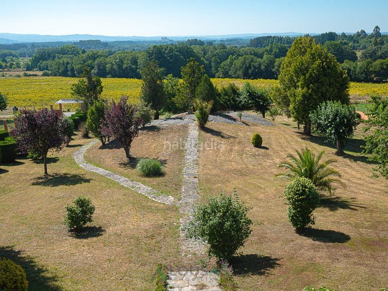 Foto 5c2ce918-164b-4b1e-a6f9-4a62c4a6a18e. Casa amb aparcament a Outeiro de Rei