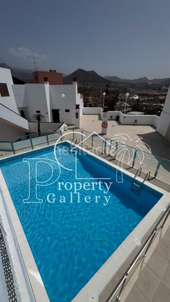 Foto 44475e30-bdb9-4e1d-a8f2-ab6a3a56ef7f. Apartamento  en venta en Los Cristianos, tenerife urbanización cerrada con piscina y aparcamiento en Arona