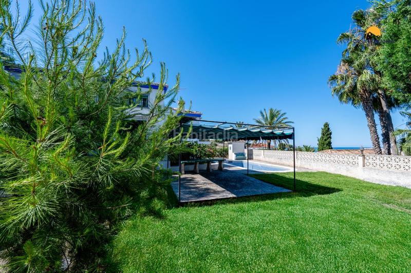 Foto 8a1fa0ce-1c59-47c6-9dd3-bd3791353a9f. Casa villa soleada con jardín y piscina en Velilla - Velilla Taramay Almuñécar