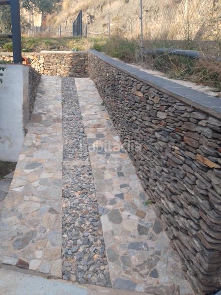 Foto 058d81fa-00fc-48ab-8b9b-c948d5e4e43a. Xalet amb xemeneia calefacció aparcament piscina a Bérchules