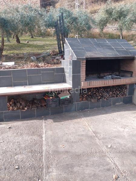 Foto 1955706d-5f00-4a14-9f33-a8cf8eb9da65. Xalet amb xemeneia calefacció aparcament piscina a Bérchules