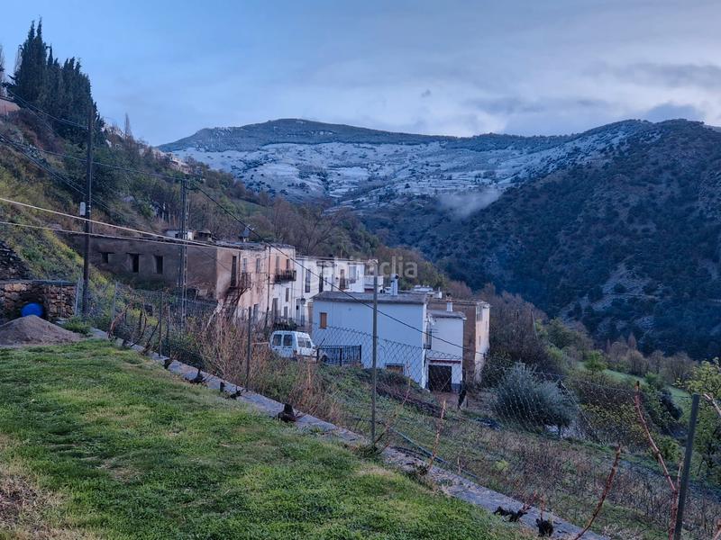 Foto 26ca4146-2f82-4703-a247-eb8d79242abb. Xalet amb xemeneia calefacció aparcament piscina a Bérchules