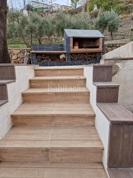 Foto 4cdb9e8c-0672-4987-b491-72475b001487. Xalet amb xemeneia calefacció aparcament piscina a Bérchules