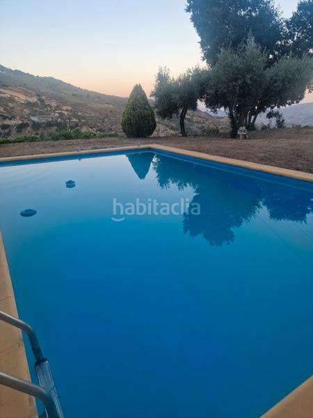 Foto 4d87ce69-cf0c-4078-99c6-99ad916f1574. Xalet amb xemeneia calefacció aparcament piscina a Bérchules