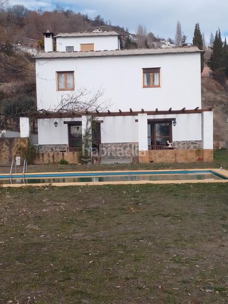 Foto 7ffc1f06-0c8d-4fc2-b67f-8d8b1a37864d. Xalet amb xemeneia calefacció aparcament piscina a Bérchules