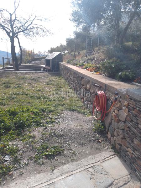 Foto eb0b89d3-f503-46b6-b6e2-fcdcdabfd667. Xalet amb xemeneia calefacció aparcament piscina a Bérchules