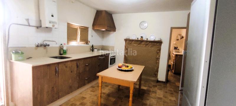 Foto 7004743b-53ff-4f33-bc16-dec52d905519. Haus mit kamin in Berja