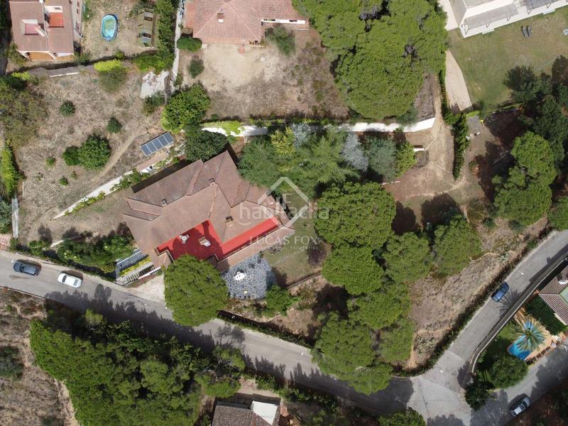 Foto 25145acc-8bff-4b0e-8bca-bfc95e6730e4. Chalet villa de estilo español de 5 dormitorios sobre una amplia parcela con vistas a mar y montaña en venta en Sant Cebrià de Vallalta