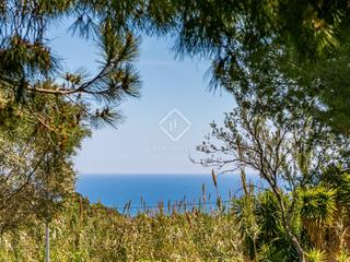 Finca rústica en Cabrera de Mar. Parcela edificable llana con fantásticas vistas al mar en venta