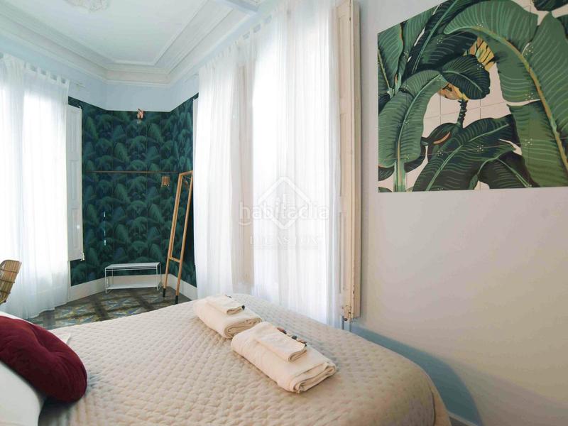 Foto 0017ae42-165b-4412-a65f-854dfb5fac11. Piso espectacular propiedad con características únicas de época, techos altos, una terraza de 60m y licencia turística en gràcia, barce en Barcelona