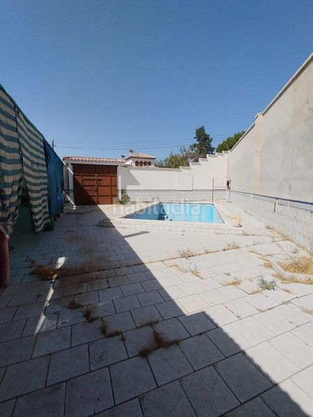 Foto 8237bce3-99f8-4160-8d19-d3d55a6b062f. Xalet amb calefacció aparcament piscina a Láchar