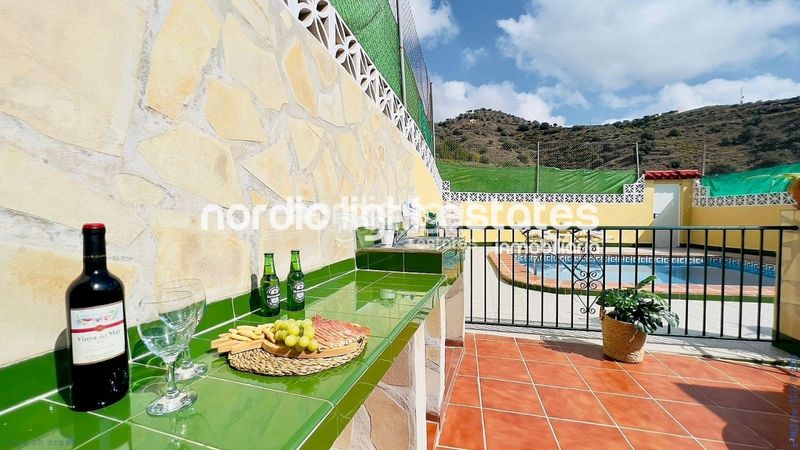 Foto e4a6ec0c-7c01-42a4-aa0d-2e3209891068. Casa en Torrox pueblo Torrox