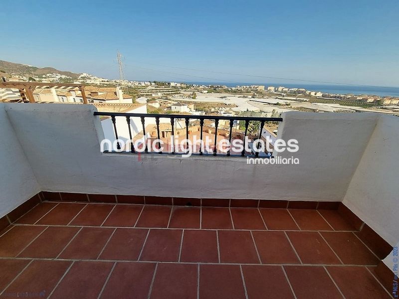Foto 51c11efd-6766-4547-9867-3a2afceb5594. Maison avec parking dans Urbanización Santa Rosa Torrox