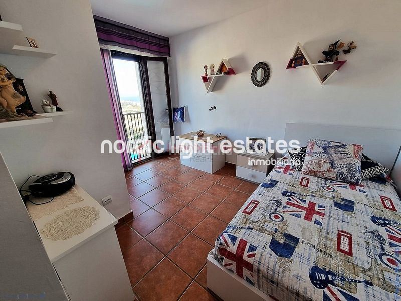Foto ae08aaf1-dfa9-4ab2-b490-c772433ee757. Maison avec parking dans Urbanización Santa Rosa Torrox