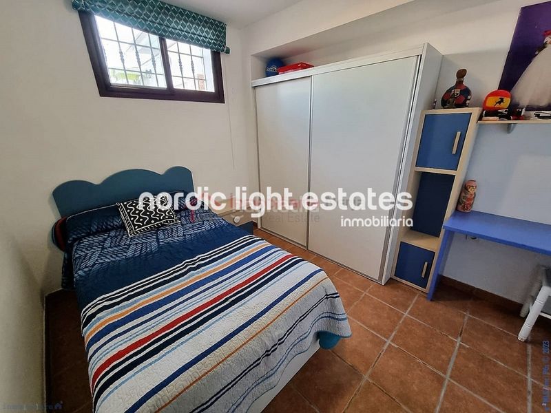 Foto d977d0f0-9cb2-470d-8928-5049429b9493. Maison avec parking dans Urbanización Santa Rosa Torrox