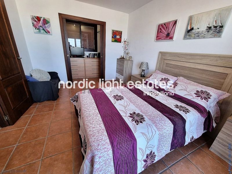 Foto f8295684-144b-47fc-a54a-b03e8ae30658. Maison avec parking dans Urbanización Santa Rosa Torrox