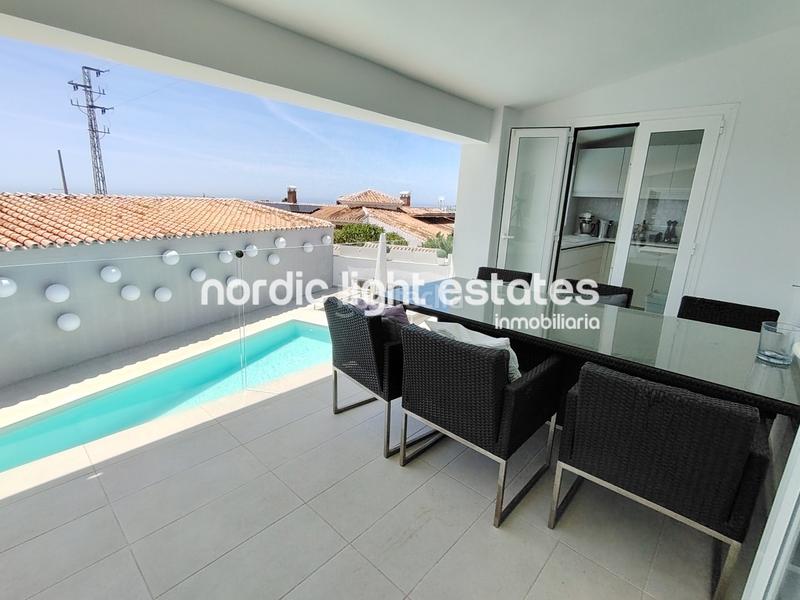 Foto e8a46e02-34c1-49e8-832a-8697890714a4. Casa amb aparcament piscina a Capistrano Nerja