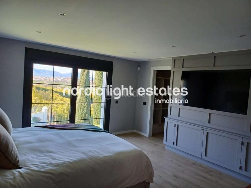 Foto 14ee4160-b8bb-418c-994e-56cd215e4af0. House with parking pool in Coín