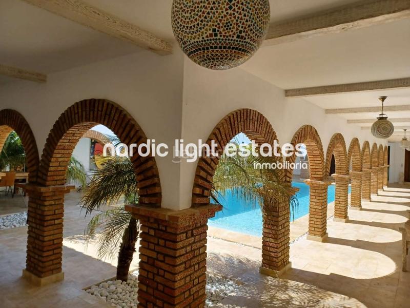 Foto cba58e23-20c8-43f0-b3a2-1ce7be8a97fa. House with parking pool in Coín