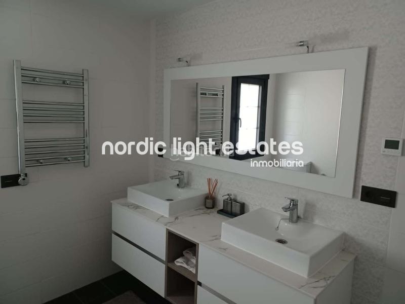 Foto cf7a4db2-25d2-4c10-8af3-5b4fb189fc59. House with parking pool in Coín