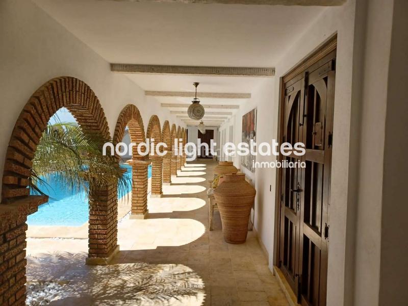 Foto dfbb1a6d-6d6a-4cd3-baa0-5468bcff02e0. House with parking pool in Coín